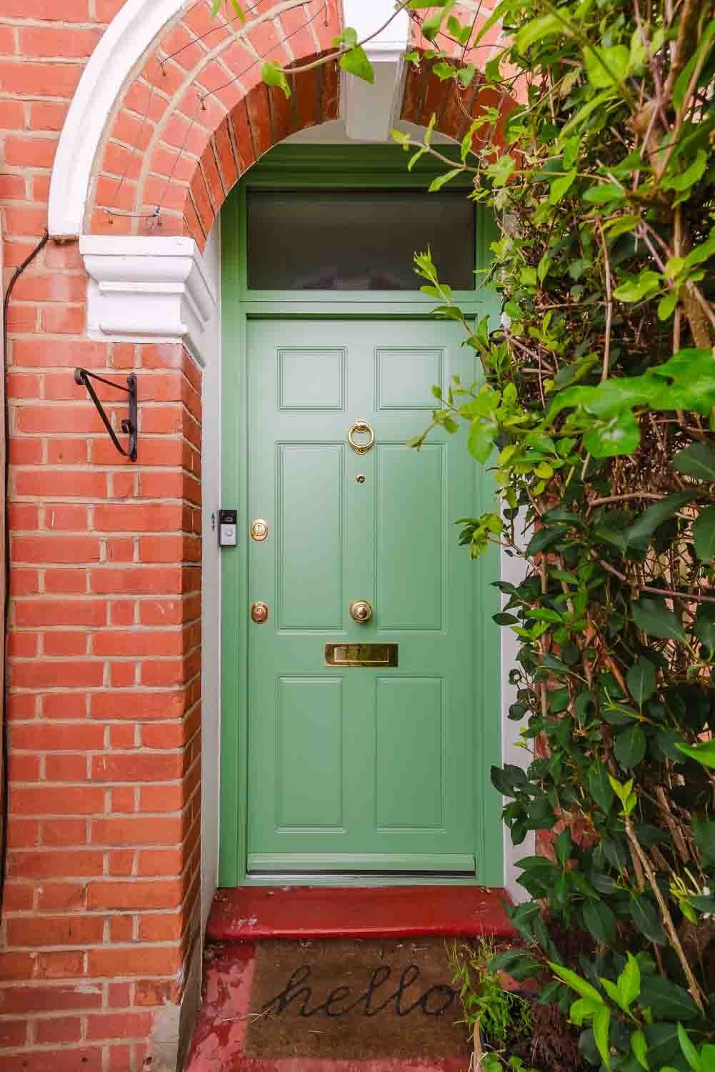 Sage traditional in arched brick surround